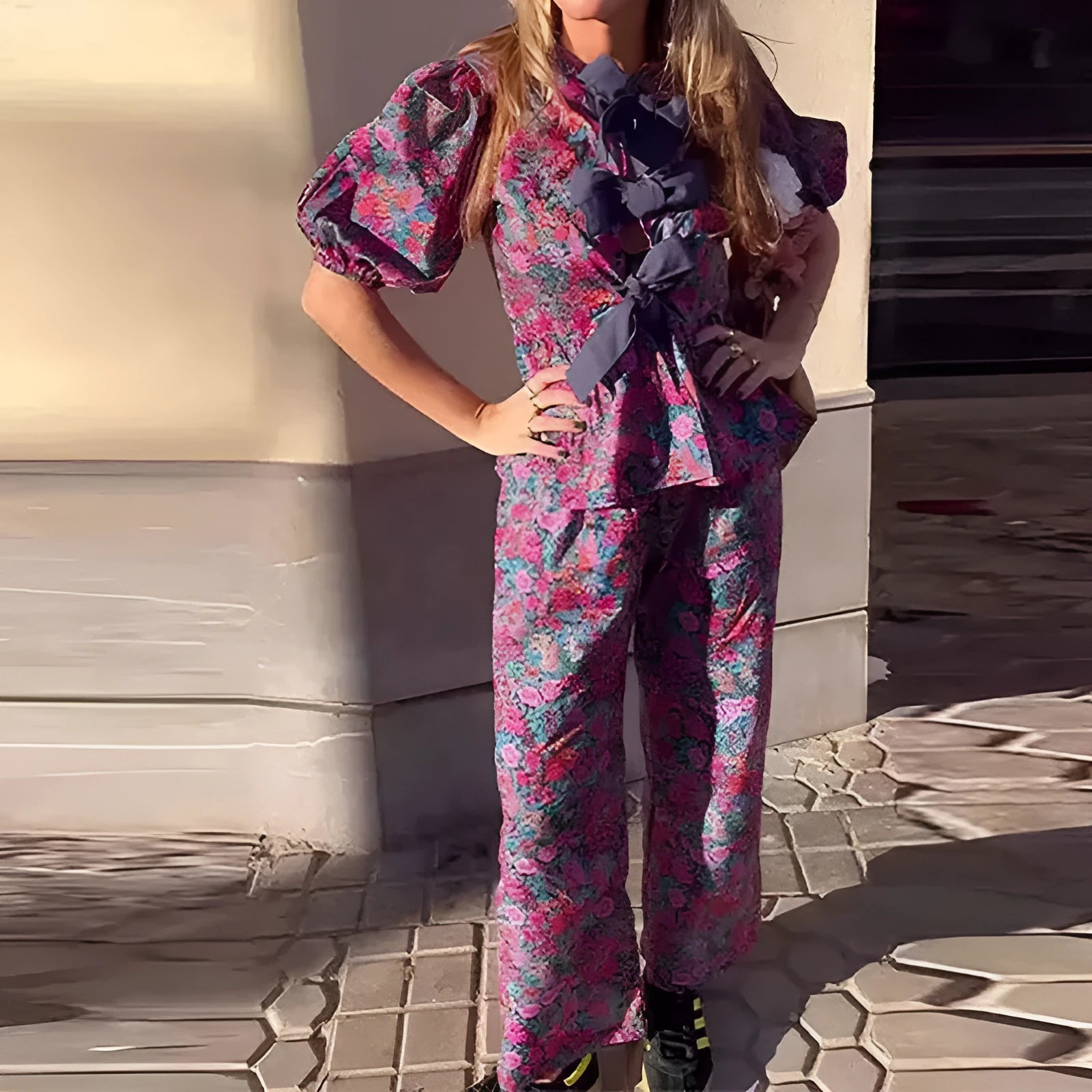 Floral printed two-piece trouser suit with puff sleeves and tie-neck detail in picture colour