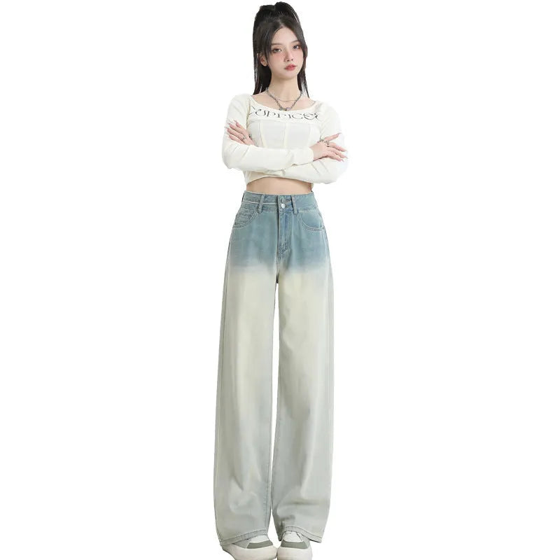Women's gradient blue straight-leg denim trousers with wide-leg cut on hanger