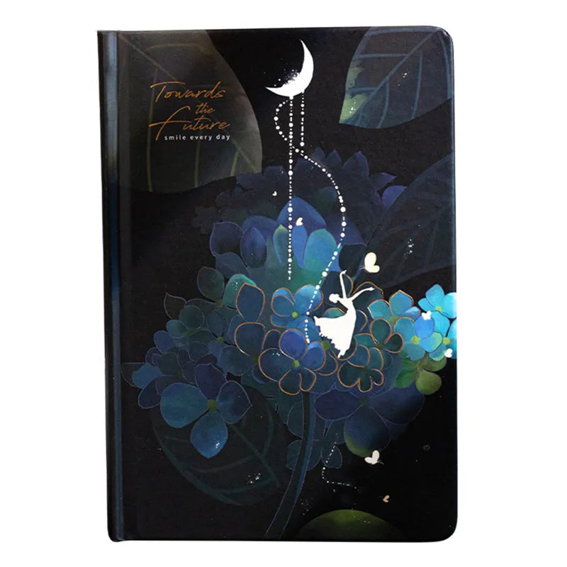 A5 notebook with luminous cover showing colour illustration interior pages and dot grid layout