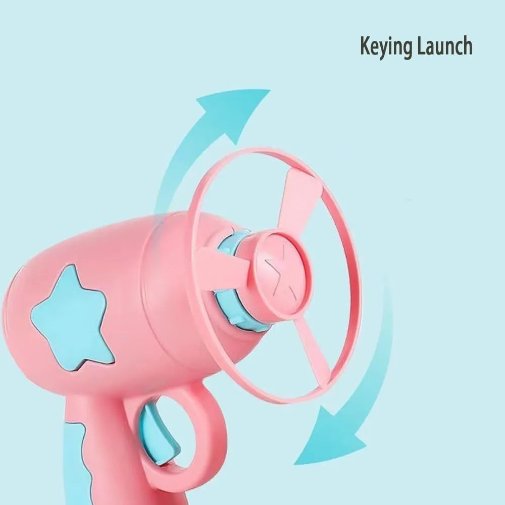 Blue or pink plastic cat toy gun with frisbee, showing compact size for indoor cat play.