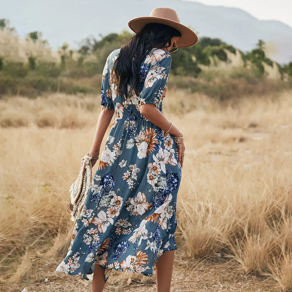 Yellow floral print women's summer dress with V-neck, short sleeves, and elasticated waist