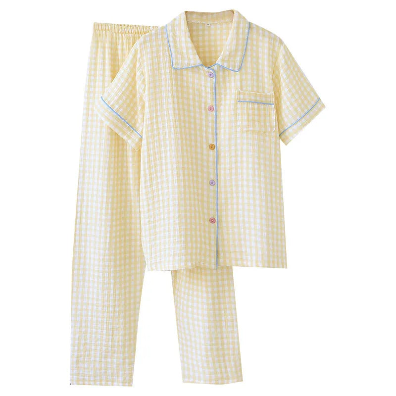 Washed cotton short-sleeved trouser set in a loose, casual style for summer, shown in a floral or plaid pattern.