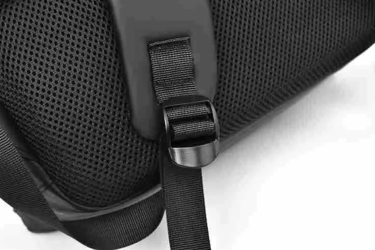 Waterproof large capacity black PU backpack with sewing thread detailing, shown closed.