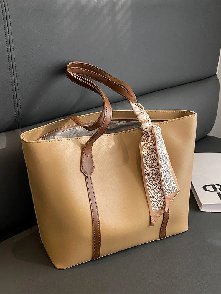 Casual tote bag with bucket fashion design in available colour combinations showing shoulder and crossbody carry options