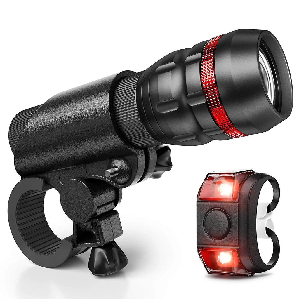 Bicycle headlight and taillight set with a separate mounting bracket on a bicycle handlebar.