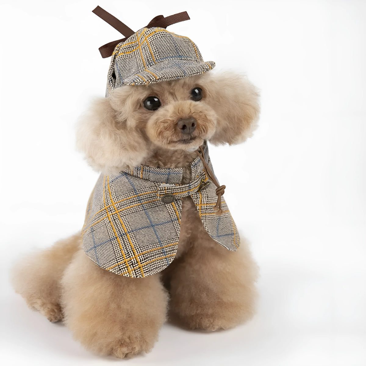Camel-coloured cotton cloak for a small dog with an adjustable hat, shown in a detective suit style.