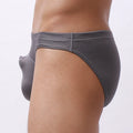 Men's transparent loose-fit nylon underwear in blue, black, white, grey, and sky blue.