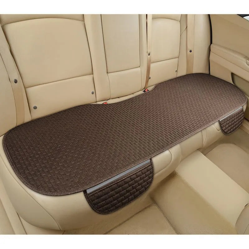 Linen plaid car seat cushion in choice of colours, shown as a single piece and a three-piece set.