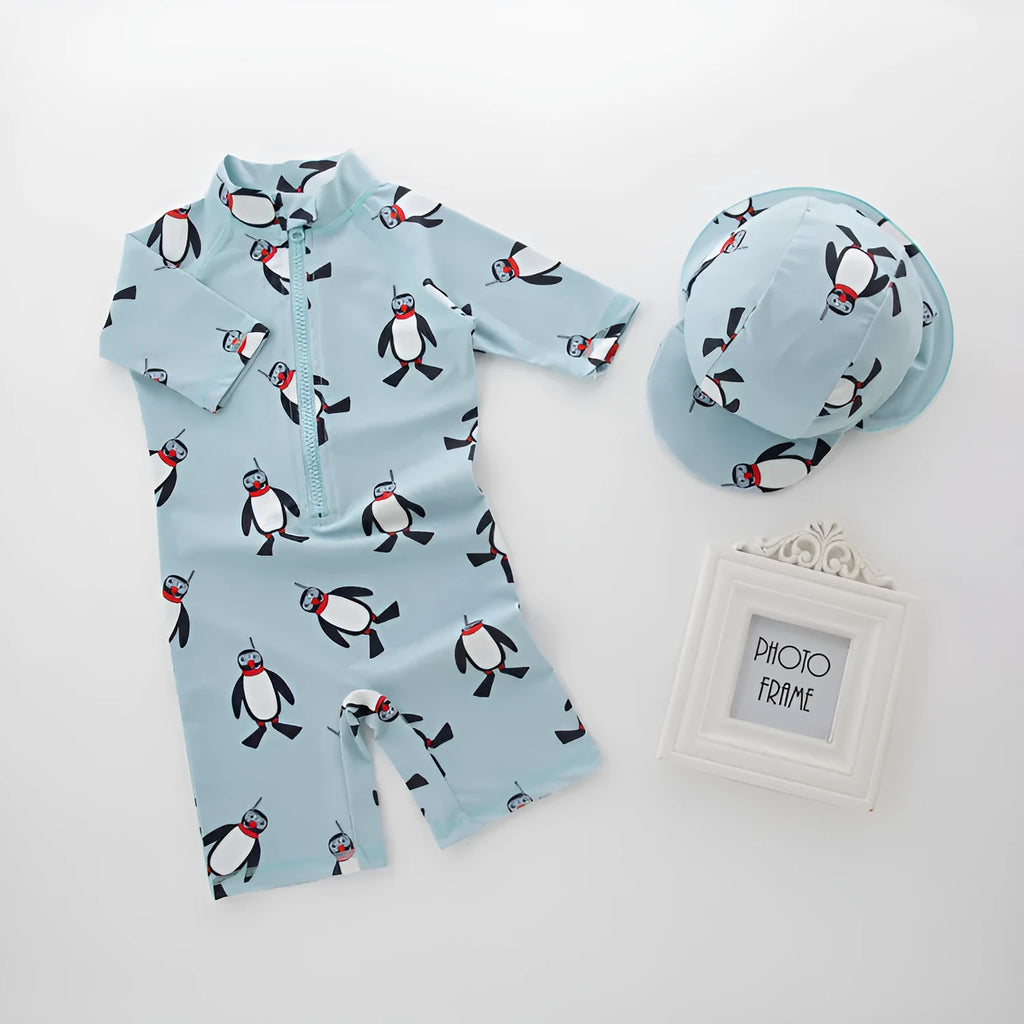Boys' penguin print long sleeve one-piece swimsuit with matching swimming cap set