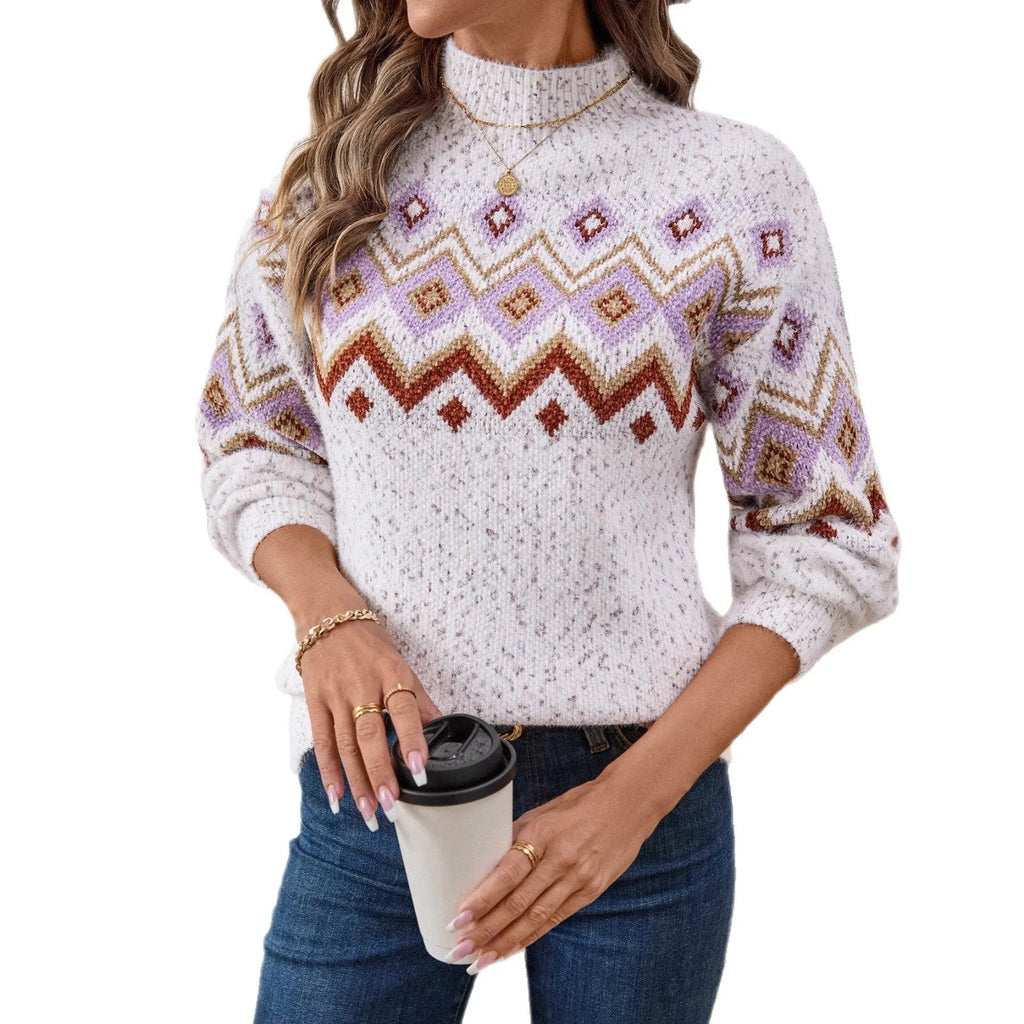 White half turtleneck jacquard sweater with geometric pattern and loose fit.