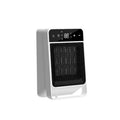 Black desktop warm air blower with touch screen display and remote control on wooden table