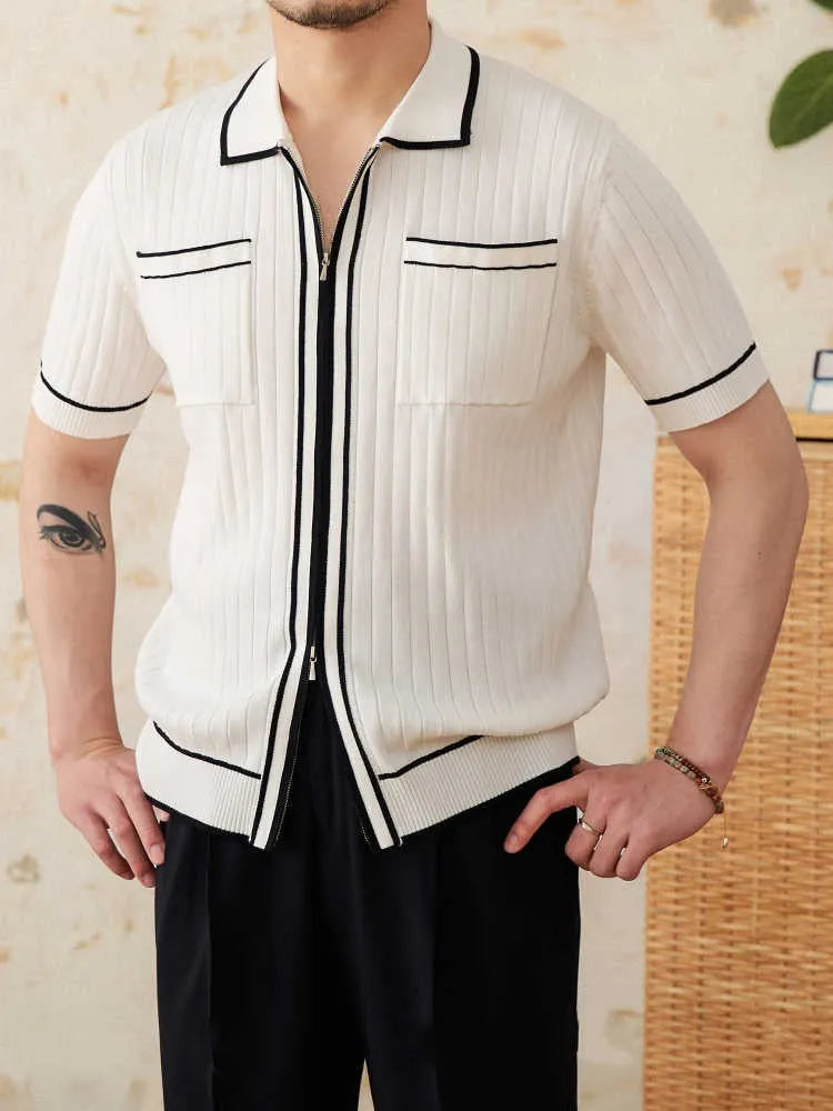 Man's black slim fit polo shirt with a lapel collar and short sleeves.