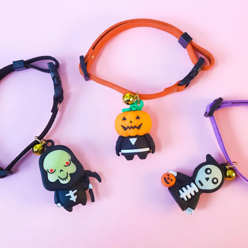 Halloween dog collar decoration showing luminous cartoon skull design on an adjustable polyester strap.