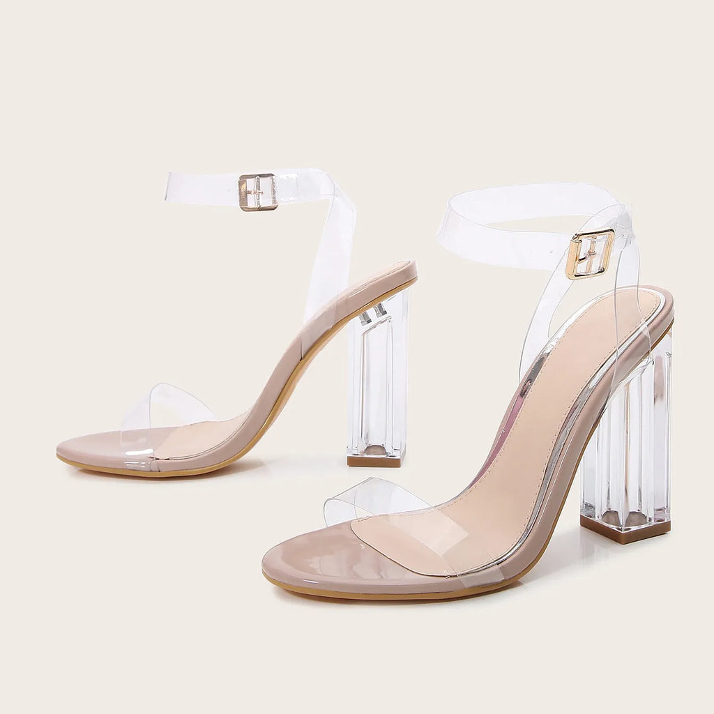Apricot coloured women's high heel sandals with a round toe and a glass heel, featuring a buckle fastening.