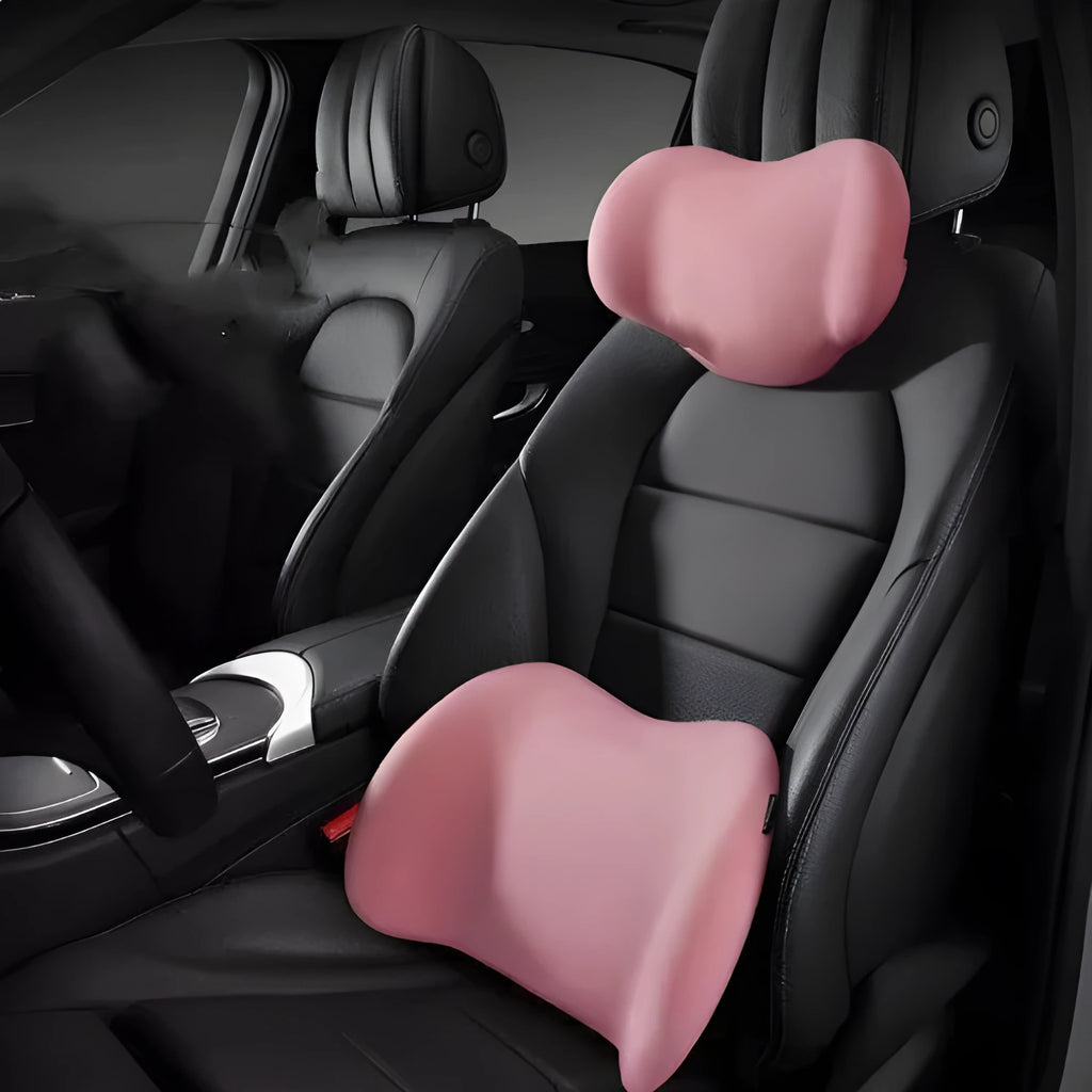 Black memory foam car headrest cushion and lumbar back support cushion set on a car seat.