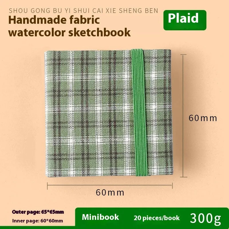 Feiluniao handmade fabric watercolour sketchbook with decorative cover, shown at 185mm length.