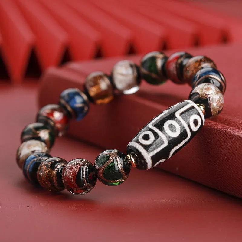 Chinese coloured glaze bracelet with snake beads in five-colour design, showing manual processing details
