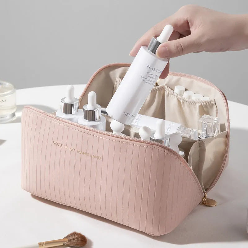 Vertical cubic pillow makeup bag in PU material with 22.5 cm height for travel storage