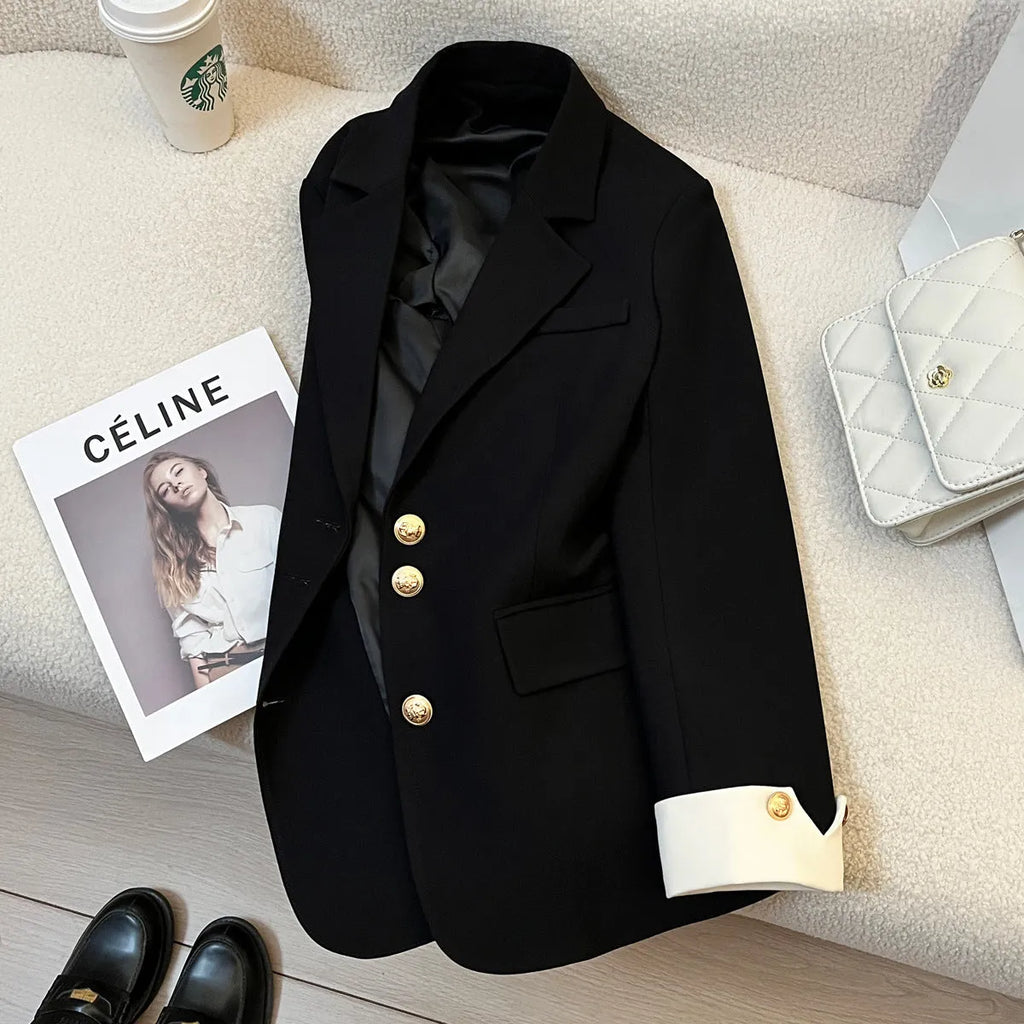 Korean style loose fit women's coat in milky white, mid-length with long sleeves and pockets.