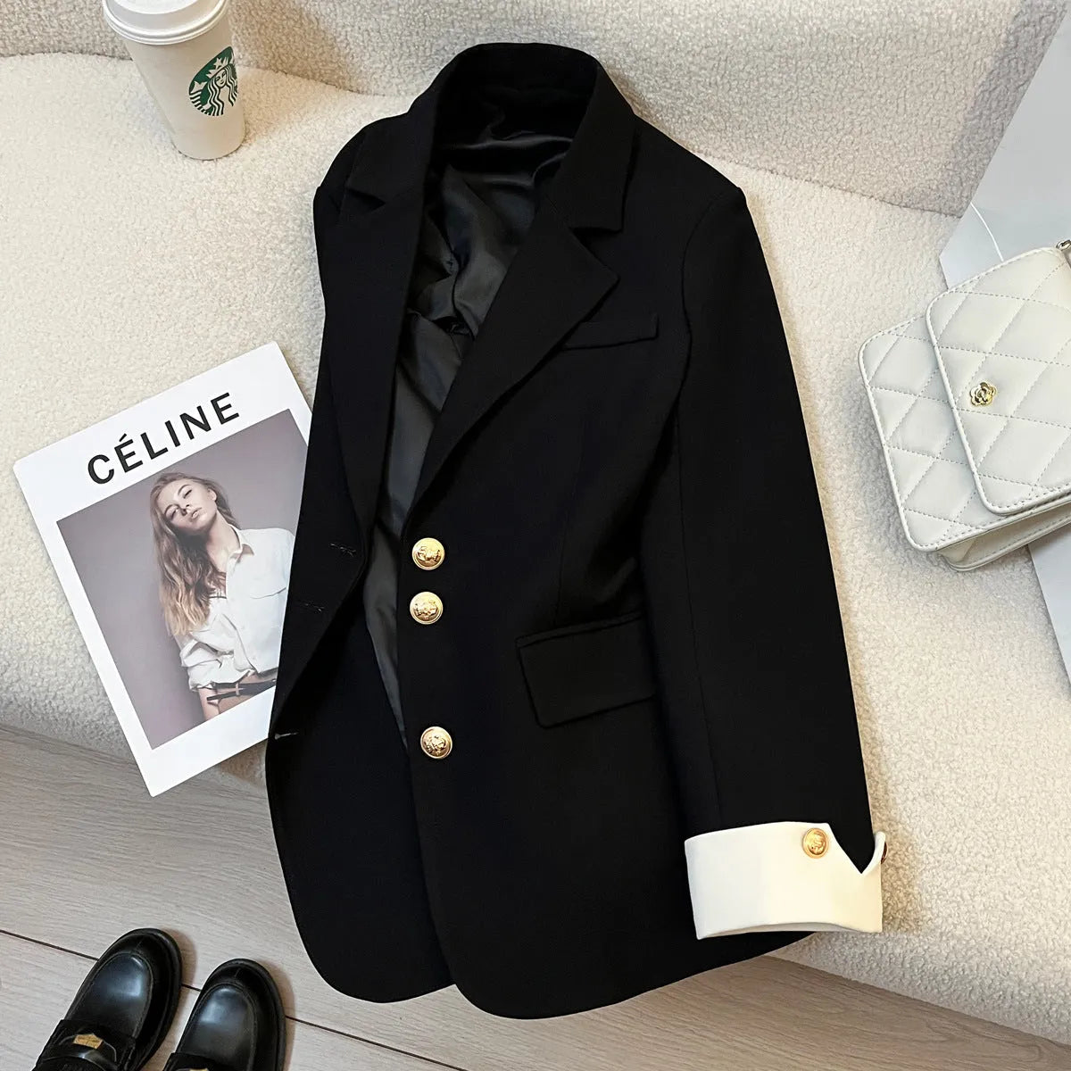 Korean style loose fit women's coat in milky white, mid-length with long sleeves and pockets.