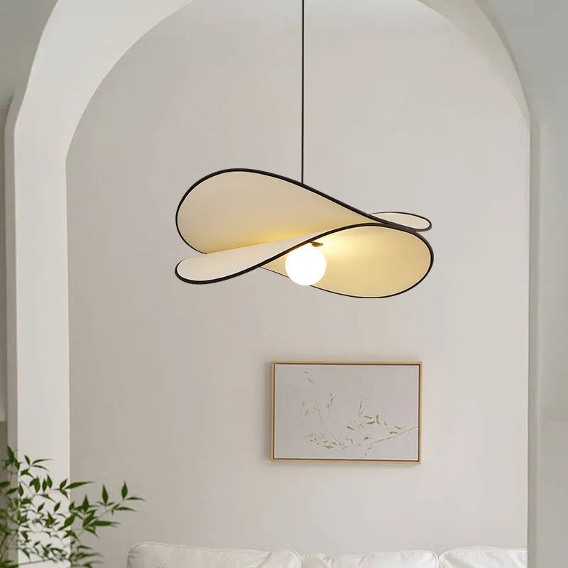 French style artistic fabric chandelier pendant light with a textured shade in a modern bedroom setting.