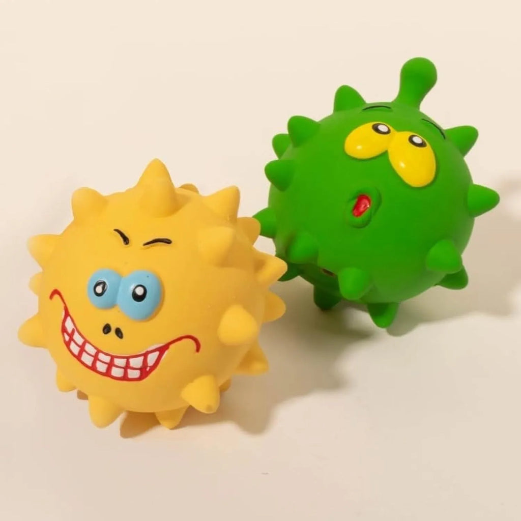 Four coloured natural latex squeaky dog balls with cute faces measuring 7.5cm