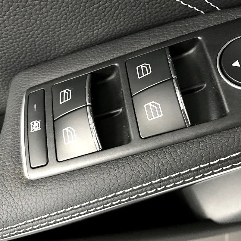 Black glitter adhesive sticker for covering a car window lift button.