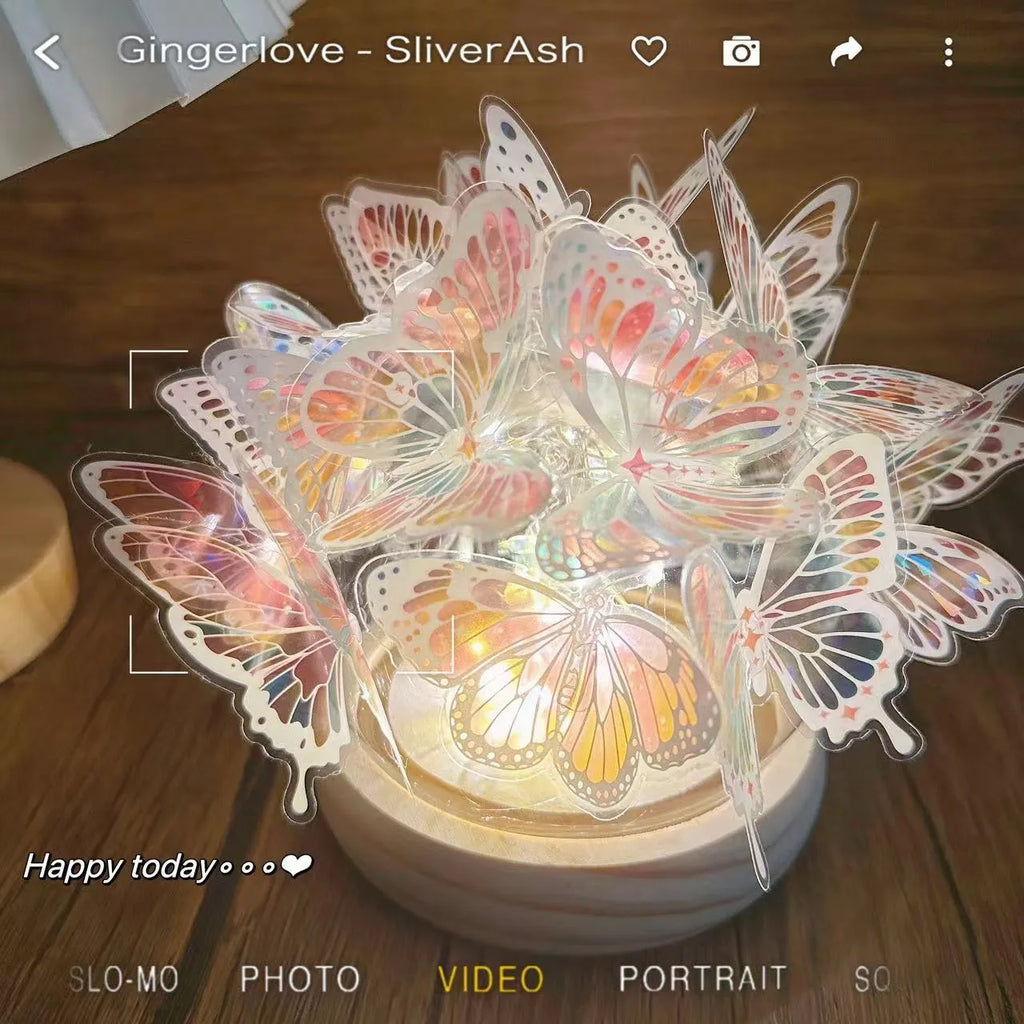 Butterfly-themed DIY night light with glass lampshade on a raw wood base.