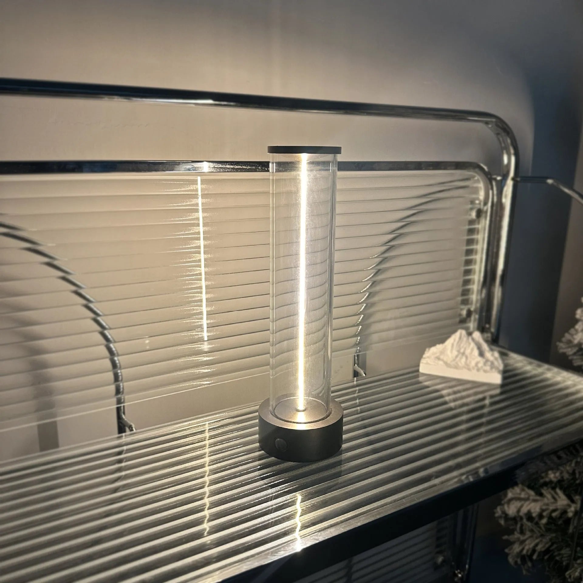 Slim modern glass LED light strip with magnetic base for USB-charged night lighting