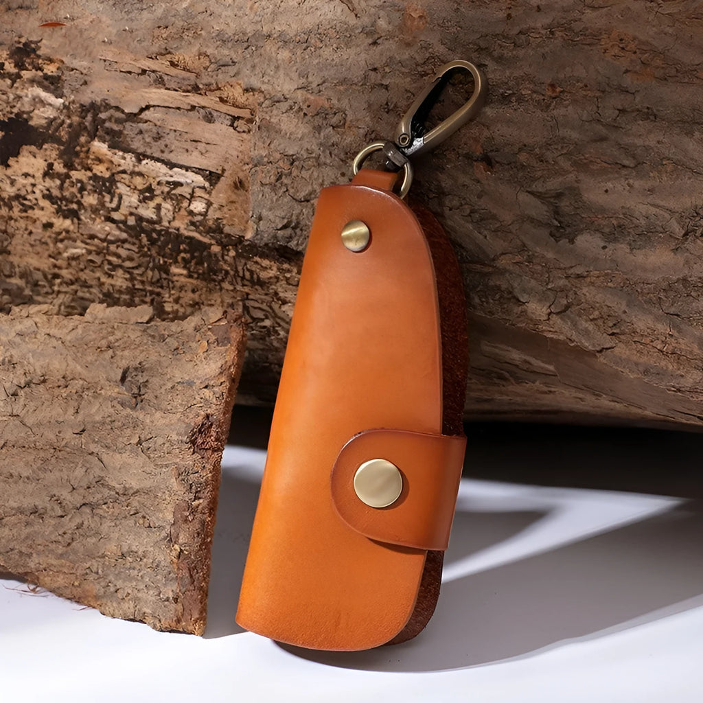 Handmade short strap leather key case for car keys in black, brown, coffee and purplish red colours.