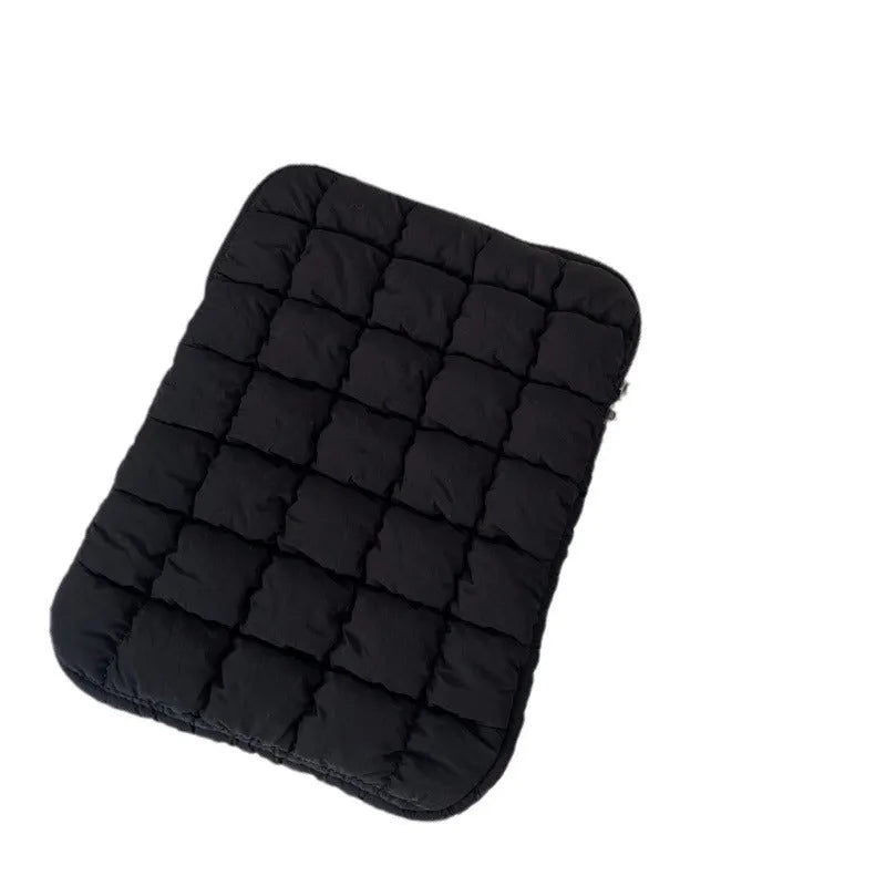 Large black nylon laptop bag with cloud cotton interior, shown open to reveal storage compartments.