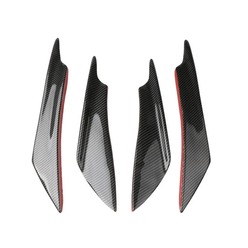 Set of four carbon fibre pattern automotive bumper blades mounted on vehicle