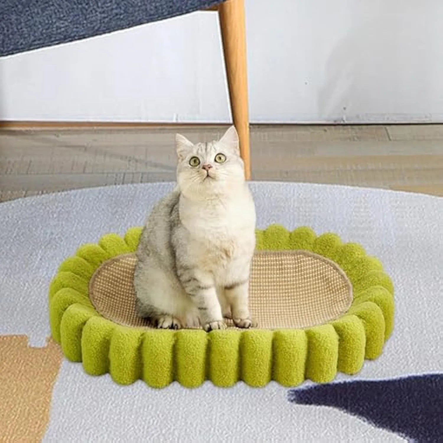 Green oval sisal cat scratch pad bowl measuring 650mm functioning as cat scratcher and bed