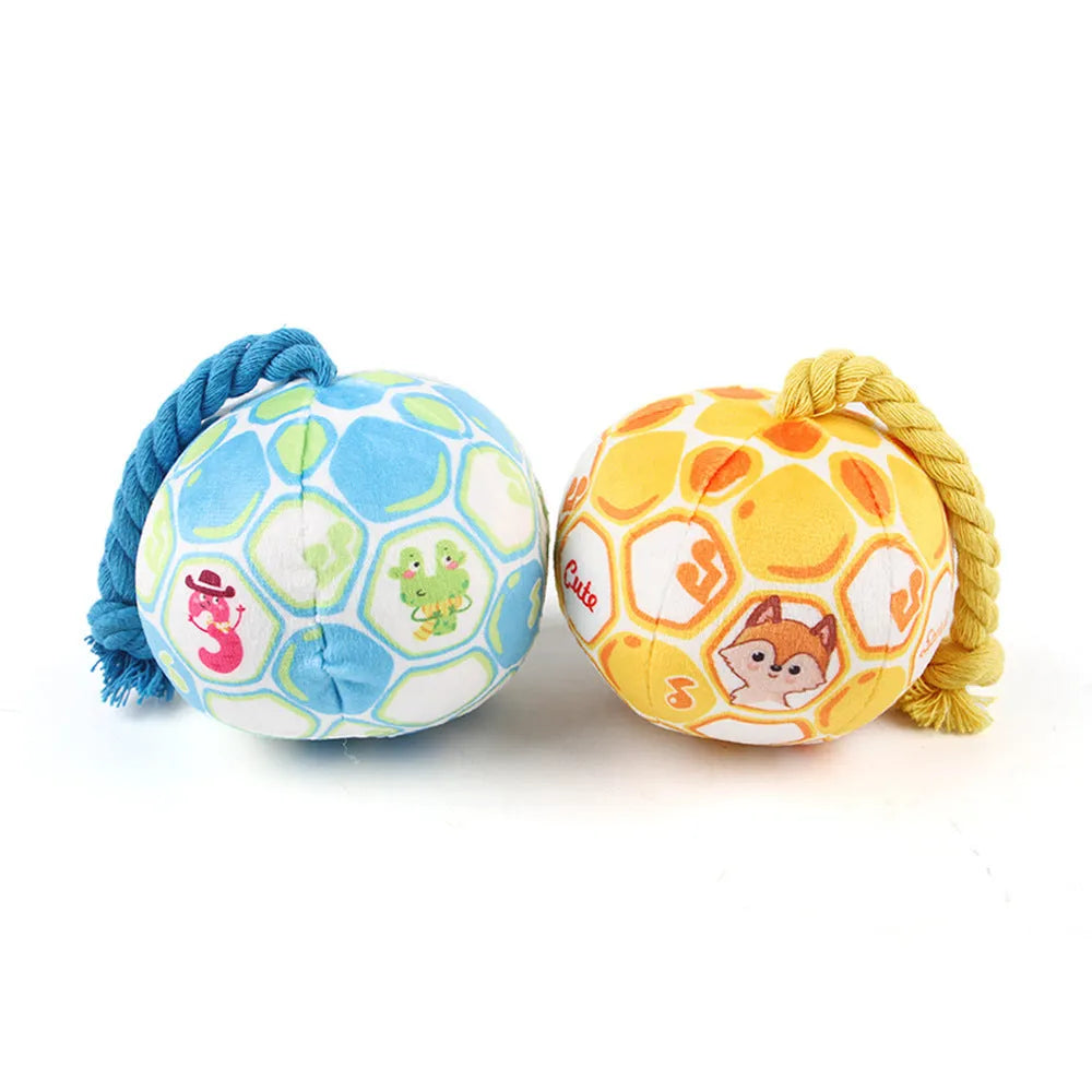 Elastic football design dog toy with cotton rope exterior and squeaker ball