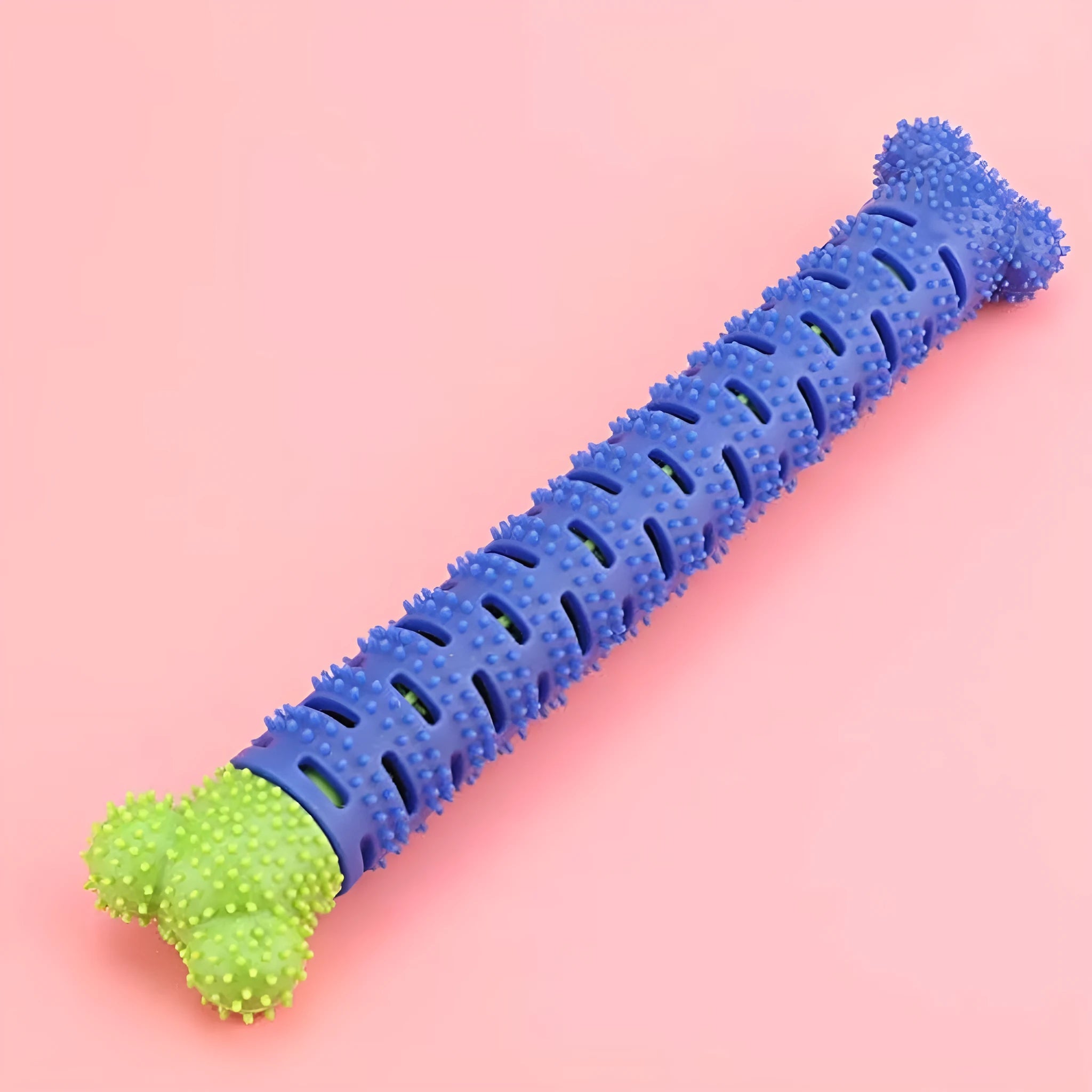 Blue and green dog dental cleaning stick with silicone nodules and serrated brush head design