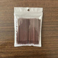 Disposable micro applicator brushes with bendable cotton swab tips and colour-coded handles for eyelash extensions and makeup