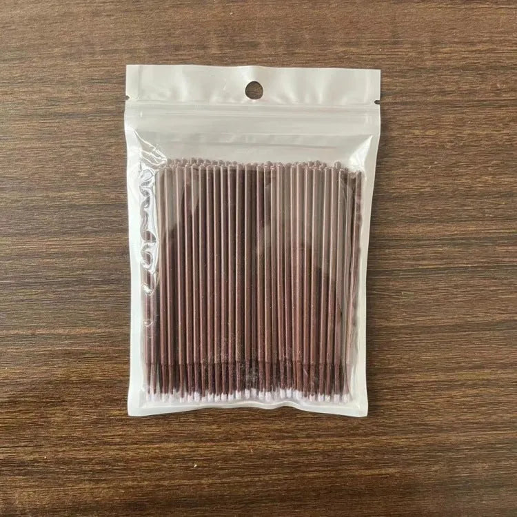Disposable micro applicator brushes with bendable cotton swab tips and colour-coded handles for eyelash extensions and makeup
