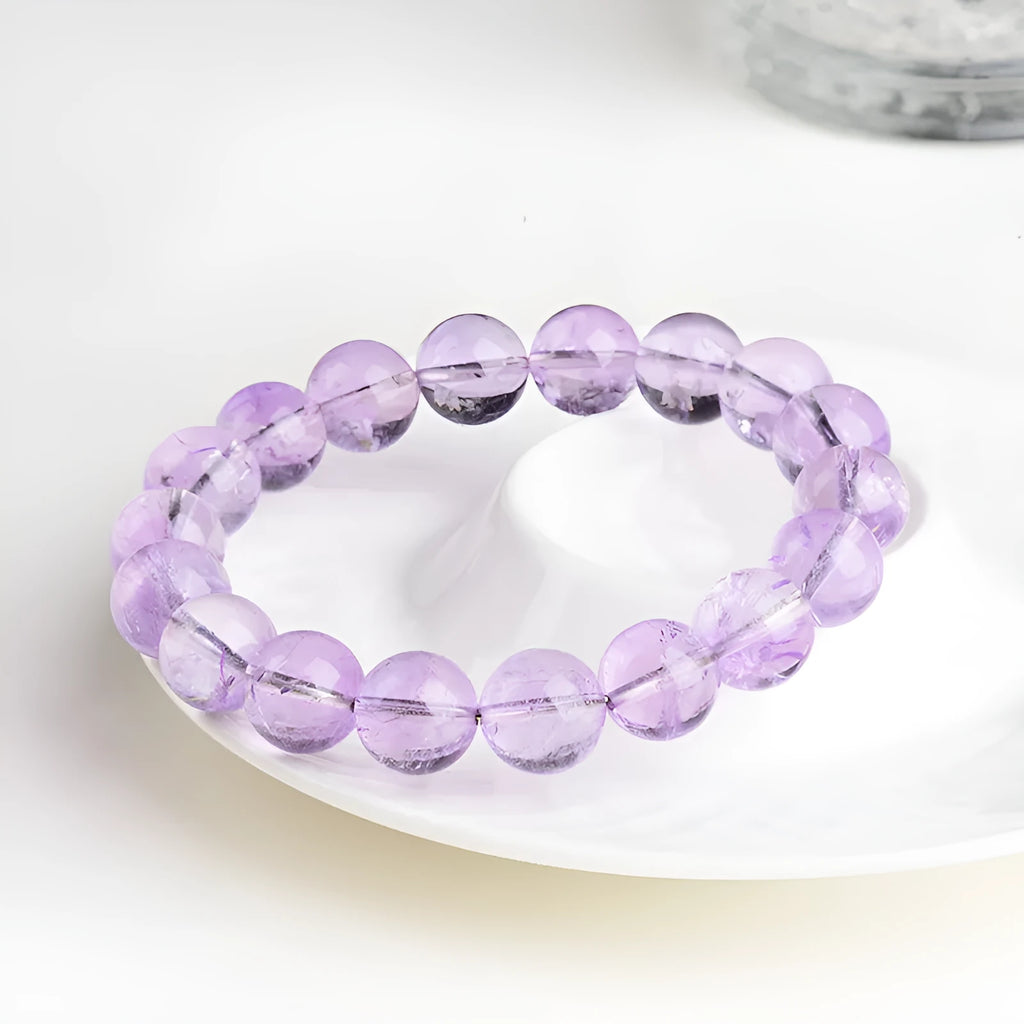 Lavender amethyst geometric water ripple bracelet with round beads on wrist