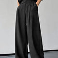 Men's black vertical striped pleated casual trousers with elastic fabric