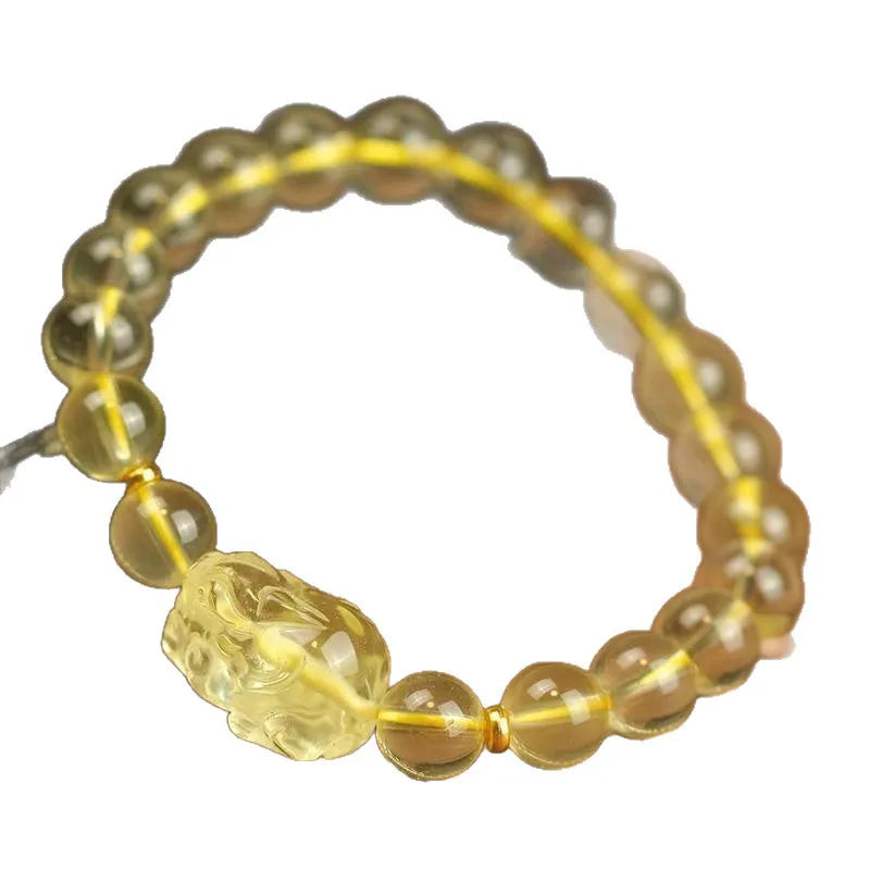Yellow leather cord Citrine Pi Xiu bracelet with Chinese charm in 6mm, 8mm, or 10mm size.