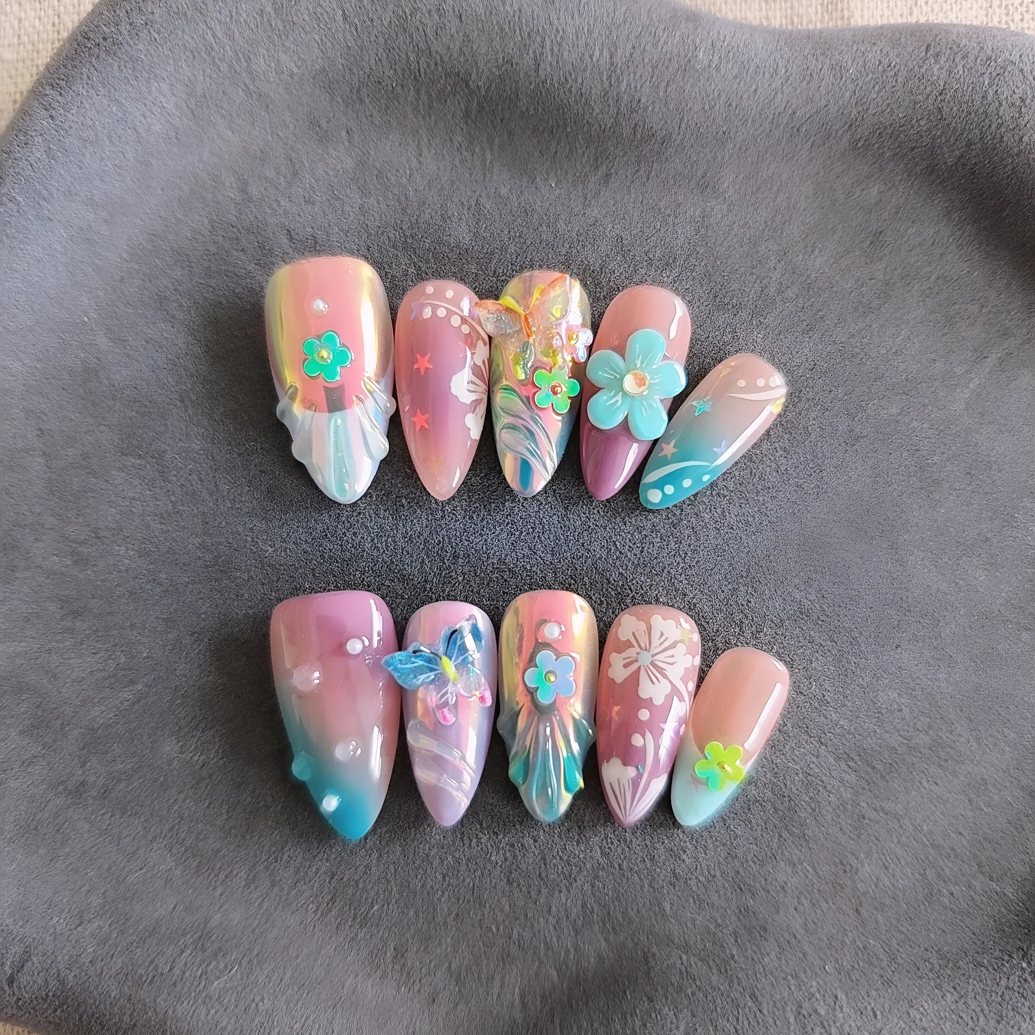 Handmade colourful small flower and butterfly nail art sculptures for gel manicure decoration