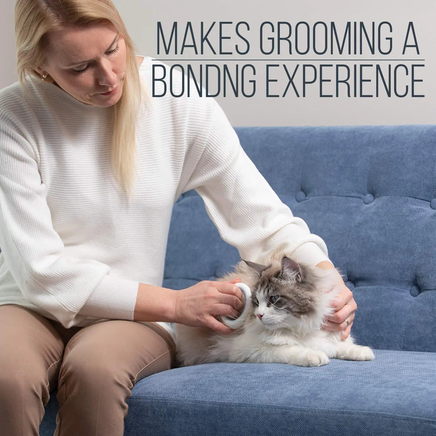 Blue pet grooming comb for cats and dogs on a white background