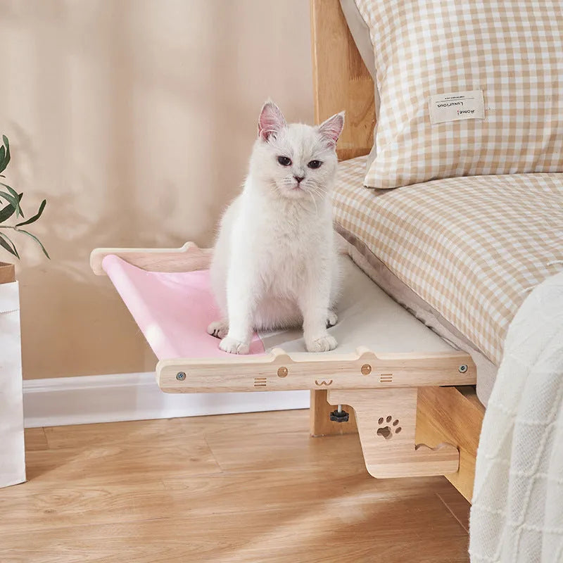 Wooden cat hanging bed hammock mounted on a balcony railing, one of seven available style variations.