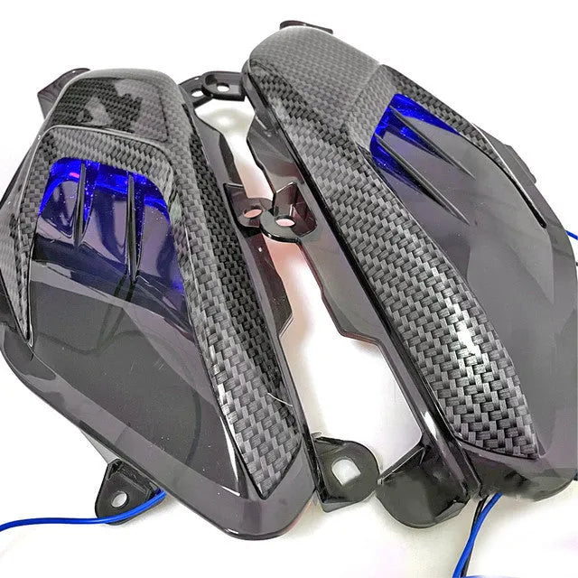 Pair of LED side lamps with carbon fibre decoration for YAMAHA NMAX125 and NMAX155 motorcycles.