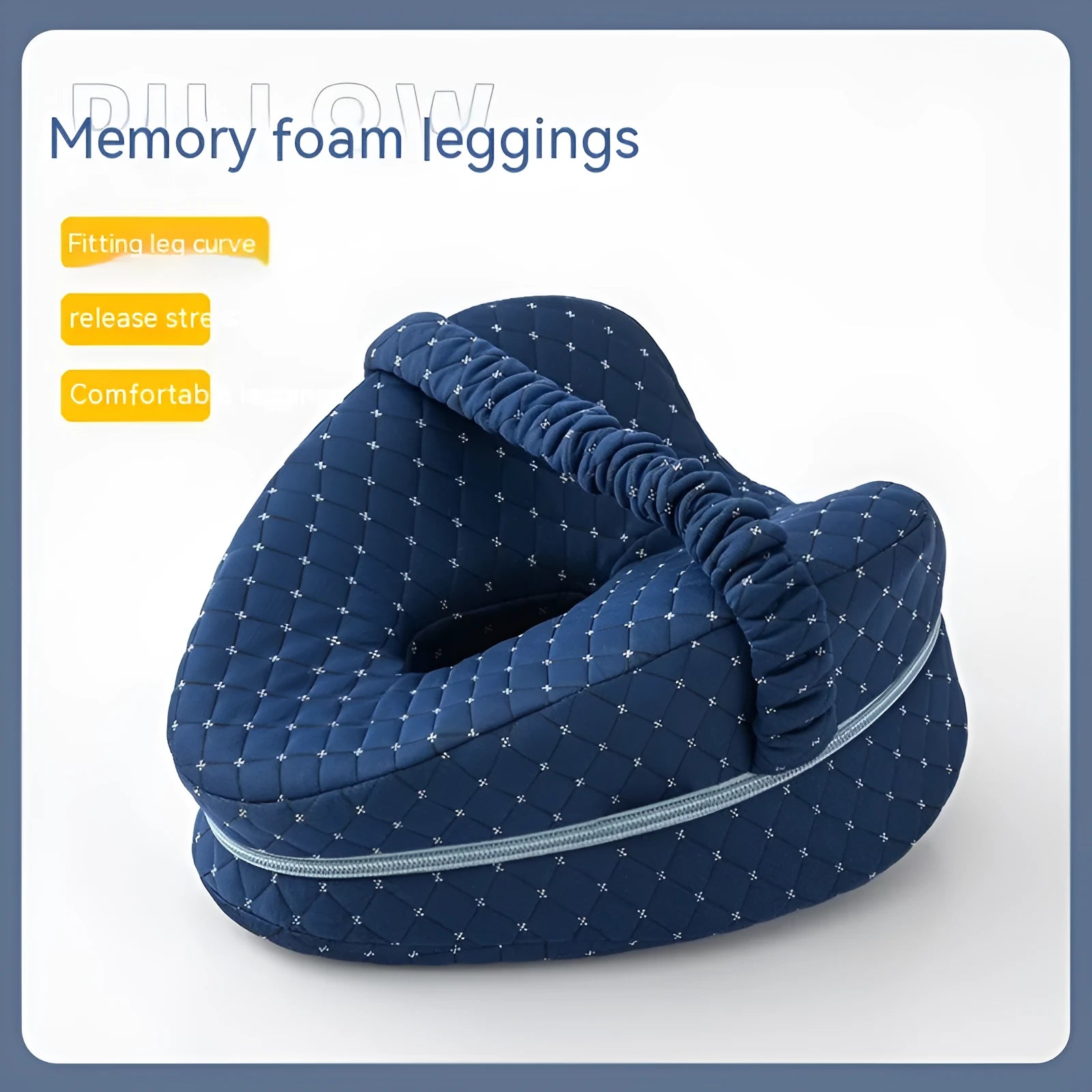 Heart-shaped dark blue memory foam leg pillow for adults on a bed.