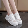 Women's black mesh half slipper with round toe, rubber sole, and height increase insole.