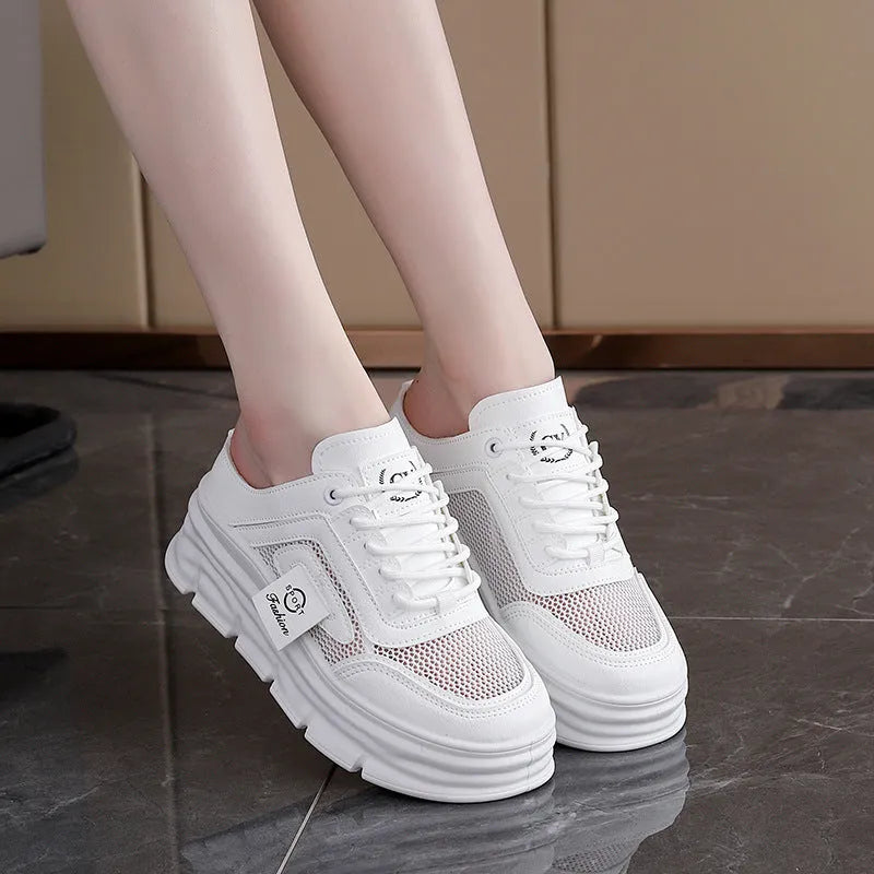 Women's black mesh half slipper with round toe, rubber sole, and height increase insole.