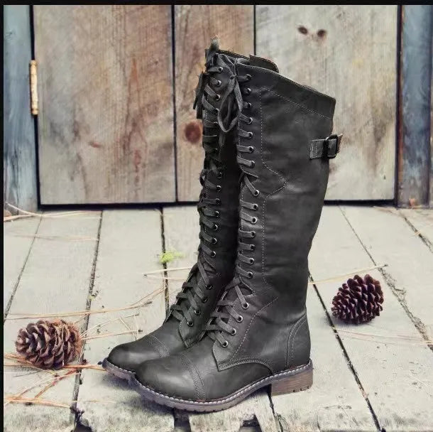 Women's black casual high leg boots with a chunky low heel and round toe