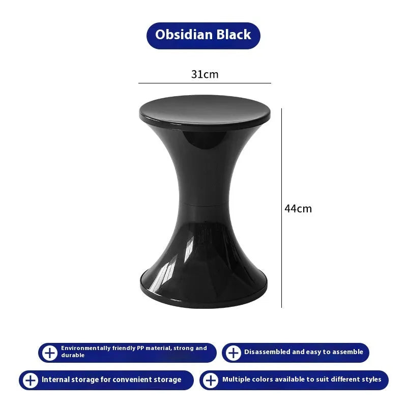 A plastic hourglass-shaped shoe changing stool in a choice of colours.