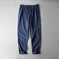 Men's mid waist linen casual trousers in navy blue, shown in a solid colour with a standard trousers length.